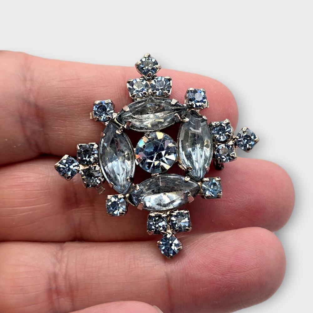 Ice Blue Starburst Rhinestone Brooch Silver Tone Mixed Cut Mid Century Cool Glam